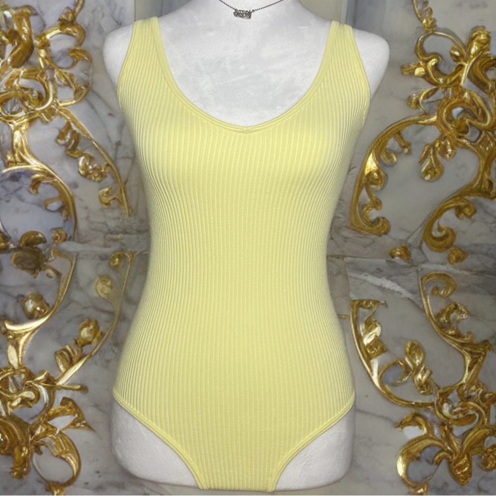 Aura yellow body suit